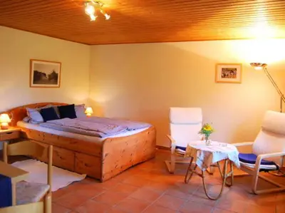 Ein Bett oder Betten in einem Zimmer der Unterkunft Ferienhaus mit Garten am Bodstedter Bodden