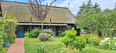Ein Garten an der Unterkunft Ferienhaus An der Heide