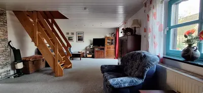 Ein Sitzbereich in der Unterkunft Ferienhaus An der Heide