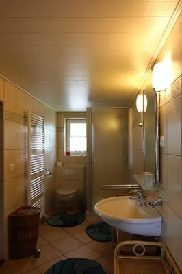 Ein Badezimmer in der Unterkunft Ferienwohnung im historischen Bauernhaus