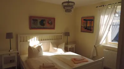 Ein Bett oder Betten in einem Zimmer der Unterkunft Akazienhaus 4