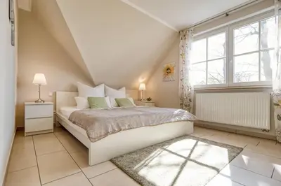 Ein Bett oder Betten in einem Zimmer der Unterkunft Ostseeträume-Zingst