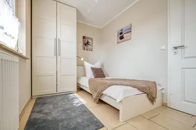 Ein Bett oder Betten in einem Zimmer der Unterkunft Ostseeträume-Zingst
