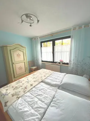 Ein Bett oder Betten in einem Zimmer der Unterkunft Seestraße 75 Wohnung Erdgeschoß