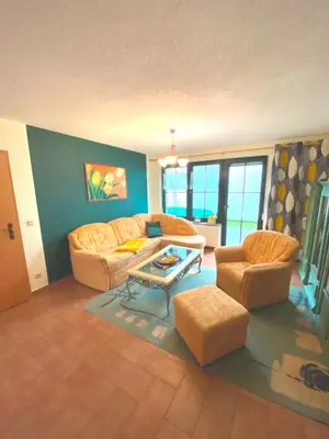 Ein Sitzbereich in der Unterkunft Seestraße 75 Wohnung Erdgeschoß