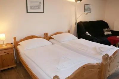 Ein Bett oder Betten in einem Zimmer der Unterkunft Sunshine