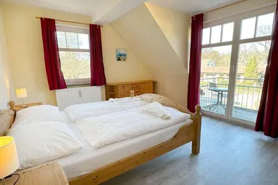 Ein Bett oder Betten in einem Zimmer der Unterkunft Holiday 1
