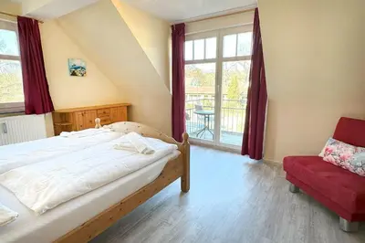 Ein Bett oder Betten in einem Zimmer der Unterkunft Holiday 1