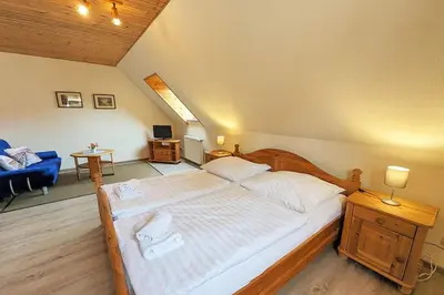 Ein Bett oder Betten in einem Zimmer der Unterkunft Haus Svea