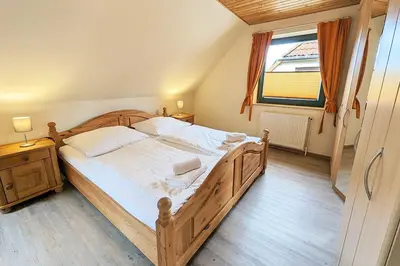 Ein Bett oder Betten in einem Zimmer der Unterkunft Haus Svea