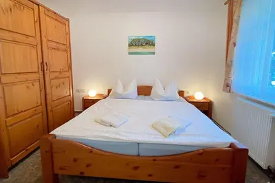 Ein Bett oder Betten in einem Zimmer der Unterkunft Haus Kleist Wohnung 2 (links)