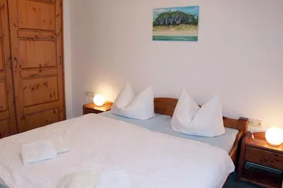 Ein Bett oder Betten in einem Zimmer der Unterkunft Haus Kleist Wohnung 2 (links)