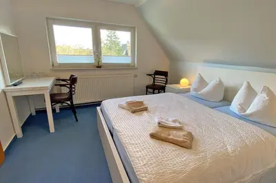 Ein Bett oder Betten in einem Zimmer der Unterkunft Haus Kleist Zimmer 1
