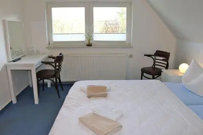 Ein Bett oder Betten in einem Zimmer der Unterkunft Haus Kleist Zimmer 1
