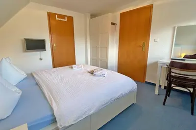 Ein Bett oder Betten in einem Zimmer der Unterkunft Haus Kleist Zimmer 1