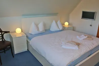 Ein Bett oder Betten in einem Zimmer der Unterkunft Haus Kleist Zimmer 1