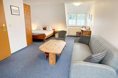 Ein Sitzbereich in der Unterkunft Haus Kleist Zimmer 5
