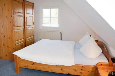 Ein Bett oder Betten in einem Zimmer der Unterkunft Haus Kleist Zimmer 5