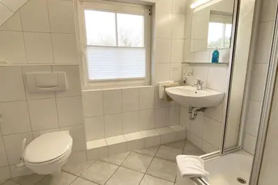 Ein Badezimmer in der Unterkunft Haus Kleist Zimmer 5
