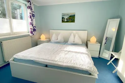 Ein Bett oder Betten in einem Zimmer der Unterkunft Haus Kleist Wohnung 3