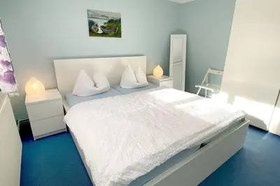 Ein Bett oder Betten in einem Zimmer der Unterkunft Haus Kleist Wohnung 3