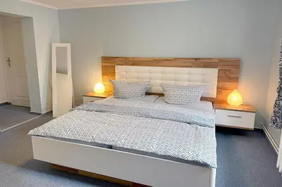 Ein Bett oder Betten in einem Zimmer der Unterkunft Haus Kleist Wohnung 4