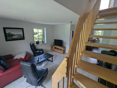 Ein Sitzbereich in der Unterkunft An de Bäk - Dat Dardel Hus