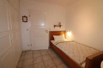 Ein Bett oder Betten in einem Zimmer der Unterkunft Am Boddenweg - Windsbraut