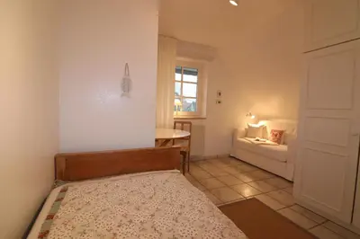 Ein Bett oder Betten in einem Zimmer der Unterkunft Am Boddenweg - Windsbraut