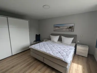 Ein Bett oder Betten in einem Zimmer der Unterkunft Ankerplatz