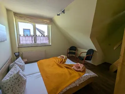 Ein Bett oder Betten in einem Zimmer der Unterkunft Apfelbaum