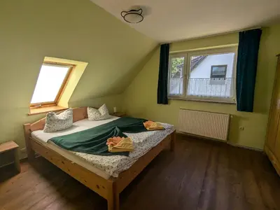Ein Bett oder Betten in einem Zimmer der Unterkunft Apfelbaum