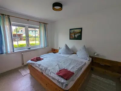Ein Bett oder Betten in einem Zimmer der Unterkunft Auster