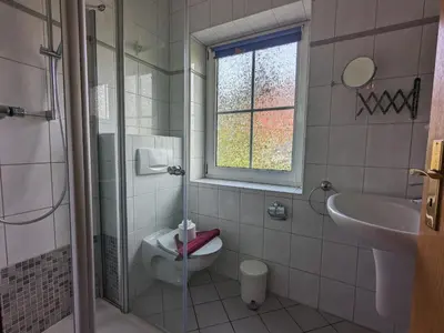 Ein Badezimmer in der Unterkunft Auster