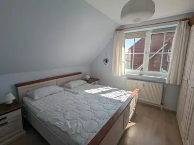 Ein Bett oder Betten in einem Zimmer der Unterkunft Auszeit