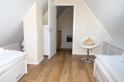 Ein Bett oder Betten in einem Zimmer der Unterkunft Premiumhaus Bodden