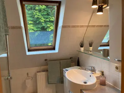 Ein Badezimmer in der Unterkunft Lütt Klönhus