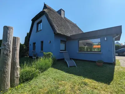 Ein Garten an der Unterkunft Dat smucke Reethus - OG