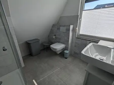 Ein Badezimmer in der Unterkunft Dat smucke Reethus - OG