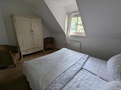 Ein Bett oder Betten in einem Zimmer der Unterkunft Zander