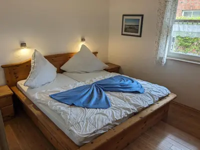 Ein Bett oder Betten in einem Zimmer der Unterkunft Westblick