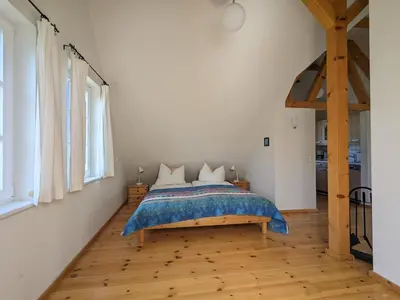 Ein Bett oder Betten in einem Zimmer der Unterkunft Boddenblick