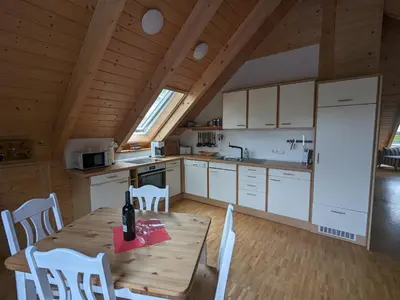 Küche/Küchenzeile in der Unterkunft Borner Holzhaus