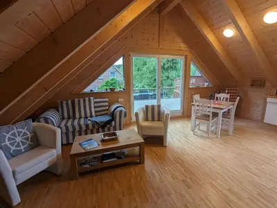 Ein Sitzbereich in der Unterkunft Borner Holzhaus