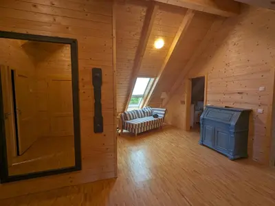 Ein Bett oder Betten in einem Zimmer der Unterkunft Borner Holzhaus