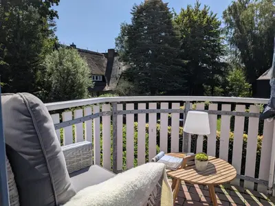 Ein Balkon oder eine Terrasse in der Unterkunft Boddenquartett - Sünnenkieker