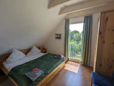 Ein Bett oder Betten in einem Zimmer der Unterkunft Weitblick