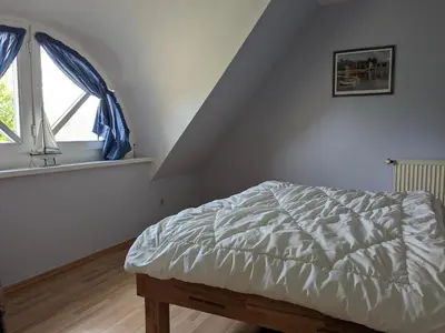 Ein Bett oder Betten in einem Zimmer der Unterkunft Sommerwind