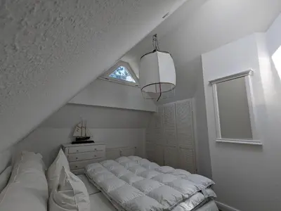 Ein Bett oder Betten in einem Zimmer der Unterkunft Schwalbennest