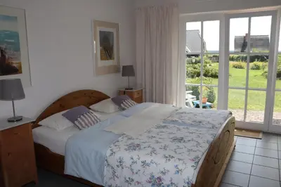 Ein Bett oder Betten in einem Zimmer der Unterkunft Sannert